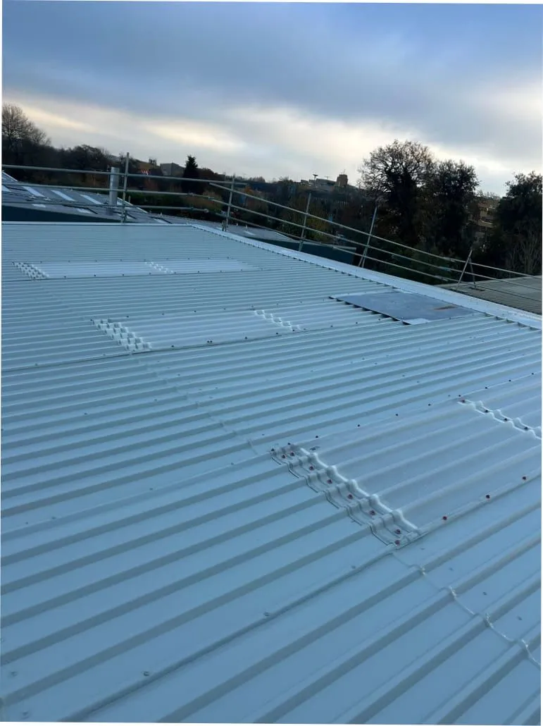 Protective roof coating applied to an industrial roof (illustrative)