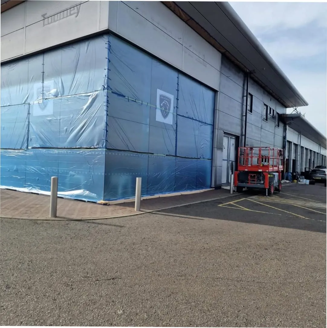 Roof overcladding installed over an existing industrial roof (illustrative)